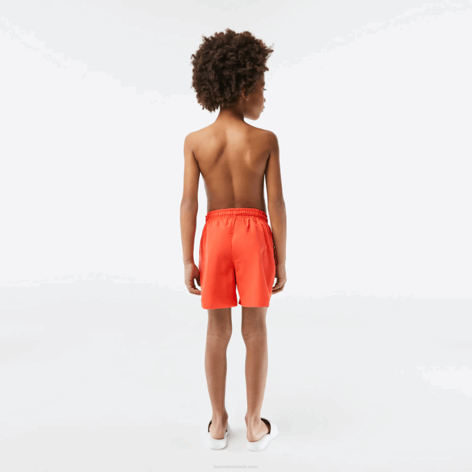 Boys Lacoste V0ZN3104 Orange Green WIG Quick-Dry Solid Swim Shorts - Image 3