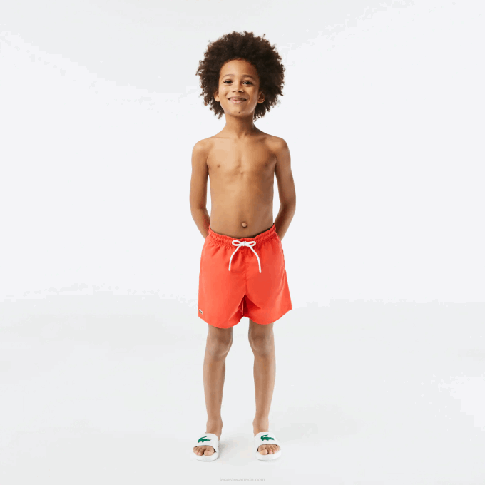 Boys Lacoste V0ZN3104 Orange Green WIG Quick-Dry Solid Swim Shorts - Image 1