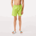 Boys Lacoste V0ZN3109 Yellow White 9ZV Printed Recycled Polyester Swim Trunks - Image 2