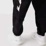 Men Lacoste V0ZN1003 Black 031 Contrast Oversized Branding Trackpants - Image 11