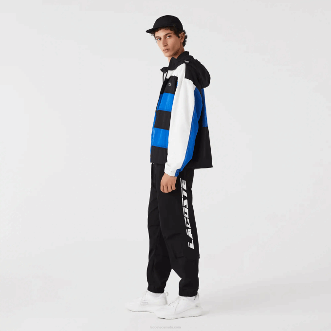 Men Lacoste V0ZN1003 Black 031 Contrast Oversized Branding Trackpants - Image 1