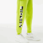 Men Lacoste V0ZN1046 Yellow 90V Reflective Print Trackpants - Image 6
