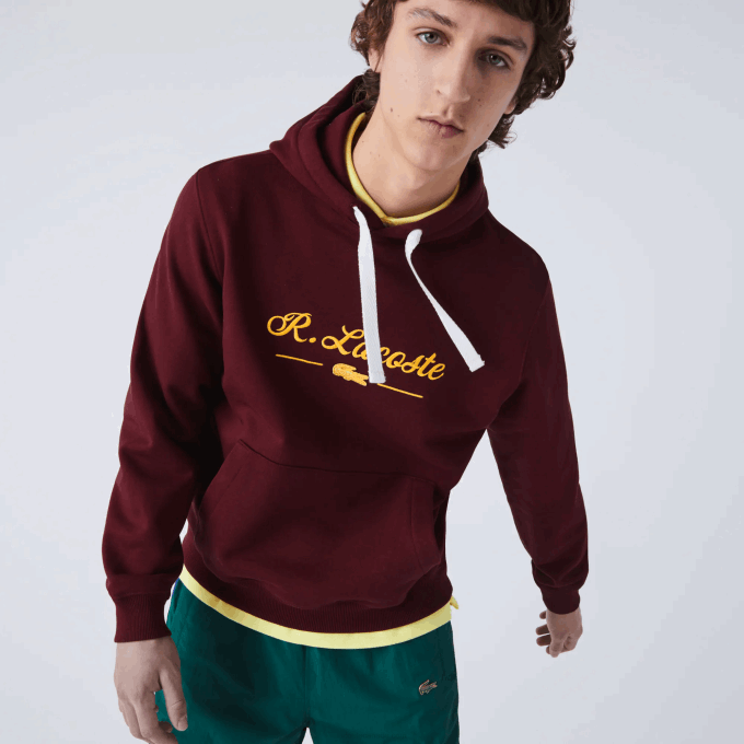 men_lacoste_v0zn1155_bordeaux_z7f_embroidered_lettering_hooded_cotton_fleece_sweatshirt.png Men Lacoste V0ZN1155 Bordeaux Z7F Embroidered Lettering Hooded Cotton Fleece Sweatshirt - Image 1