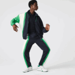 Men Lacoste V0ZN1180 Navy Blue White Green 19V Lightweight Water-Repellent Color-Block Trackpants - Image 2