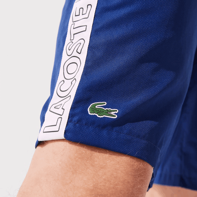 Men Lacoste V0ZN1505 Blue White EMJ SPORT Branded Side Bands Shorts - Image 2