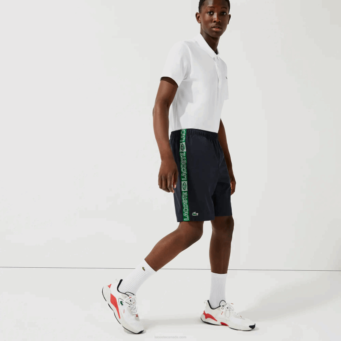 Men Lacoste V0ZN1506 Navy Blue Green MR0 SPORT Branded Side Bands Shorts - Image 2