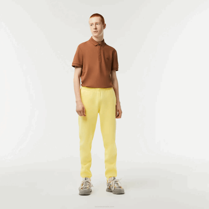 men_lacoste_v0zn349_yellow_107_tapered_fit_fleece_trackpants.png Men Lacoste V0ZN349 Yellow 107 Tapered Fit Fleece Trackpants - Image 1