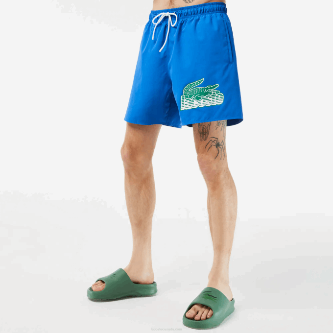 Men Lacoste V0ZN518 Blue KXB Quick-Dry Swim Trunks with Travel Bag - Image 2