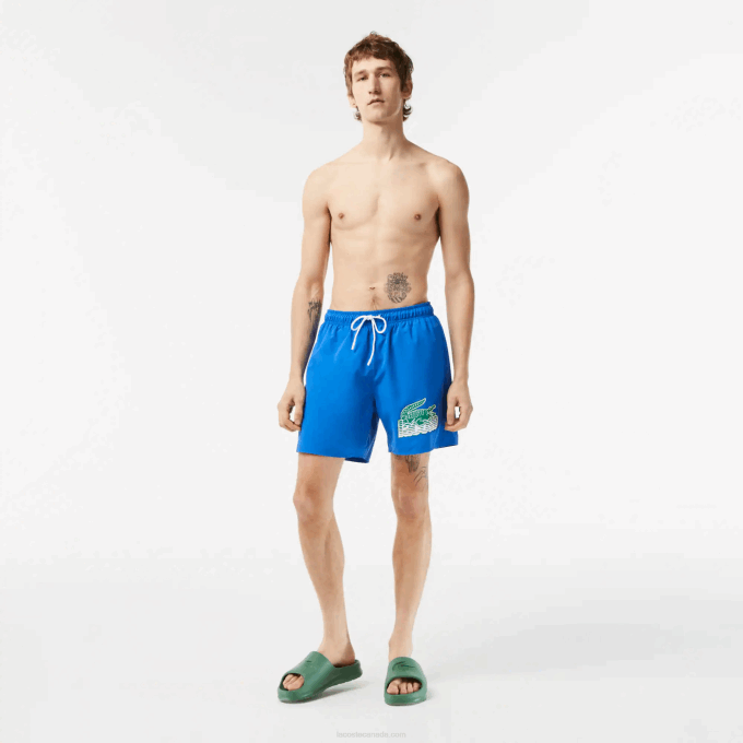 Men Lacoste V0ZN518 Blue KXB Quick-Dry Swim Trunks with Travel Bag - Image 1