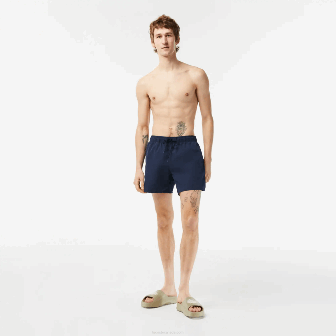 Men Lacoste V0ZN536 Navy Blue Green 802 Light Quick-Dry Swim Shorts - Image 1