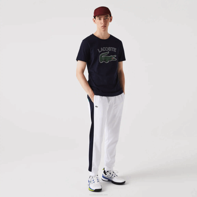 Men Lacoste V0ZN994 White Navy Blue Green 9GG SPORT Run-Resistant Tennis Trackpants - Image 1