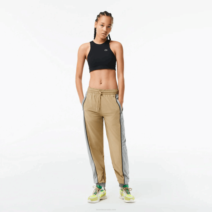 Women Lacoste V0ZN2427 Beige Grey 7JE Perforated Effect Track Pants - Image 1