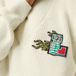 Women Lacoste V0ZN2642 White 70V Comic Badge V-Neck Wool Sweater - Image 6