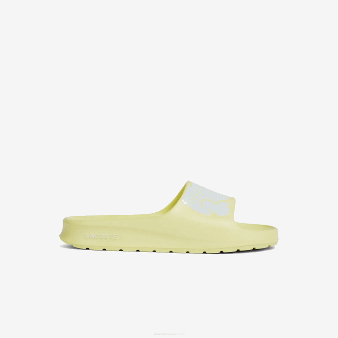 women_lacoste_v0zn2759_light_yellow_white_241_croco_2_0_synthetic_logo_strap_slides.png Women Lacoste V0ZN2759 Light Yellow & White 241 Croco 2.0 Synthetic Logo Strap Slides - Image 1